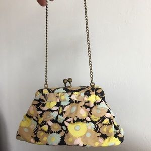 Small chain clutch purse.